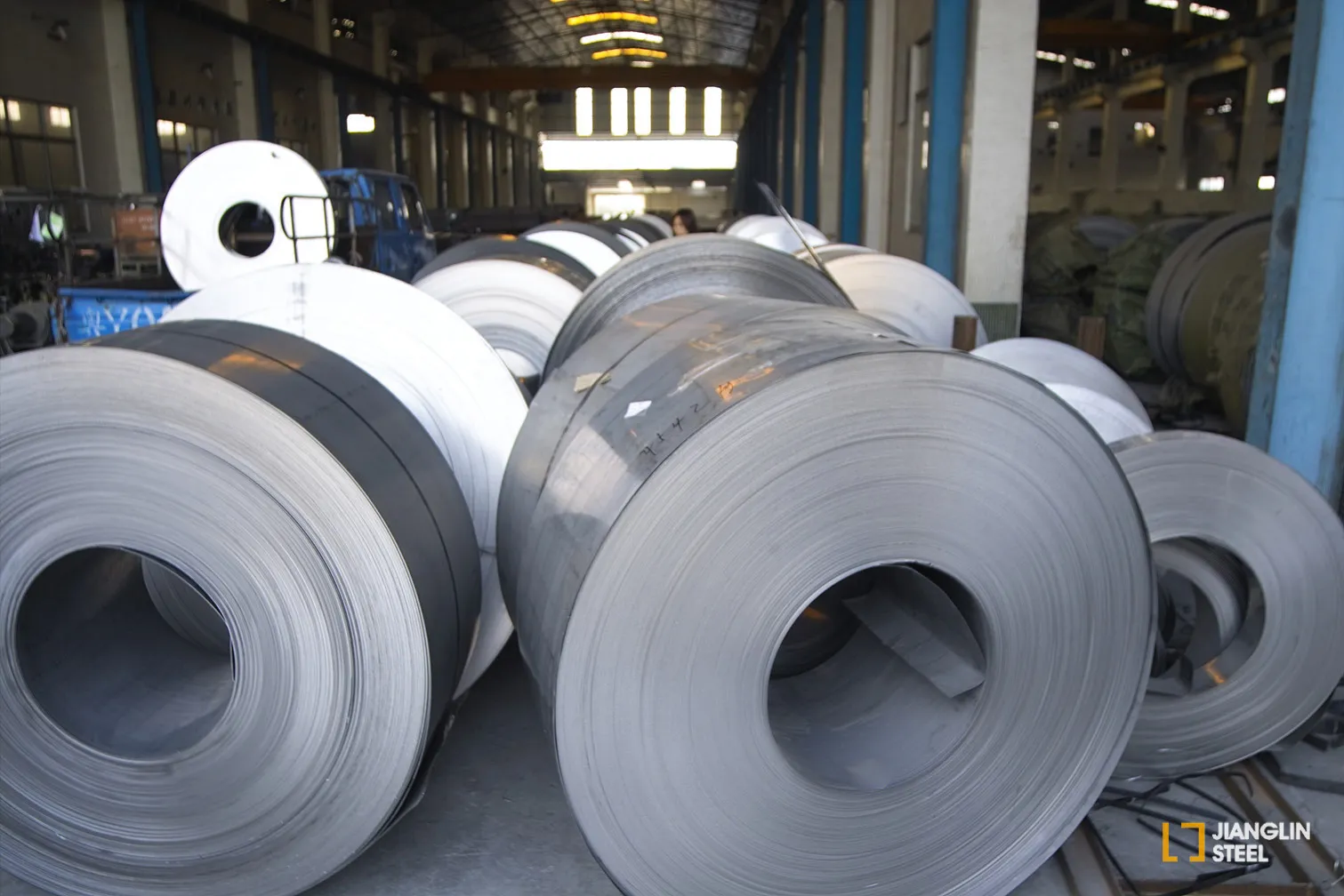 Jianglin stainless steel coils stored in a workshop